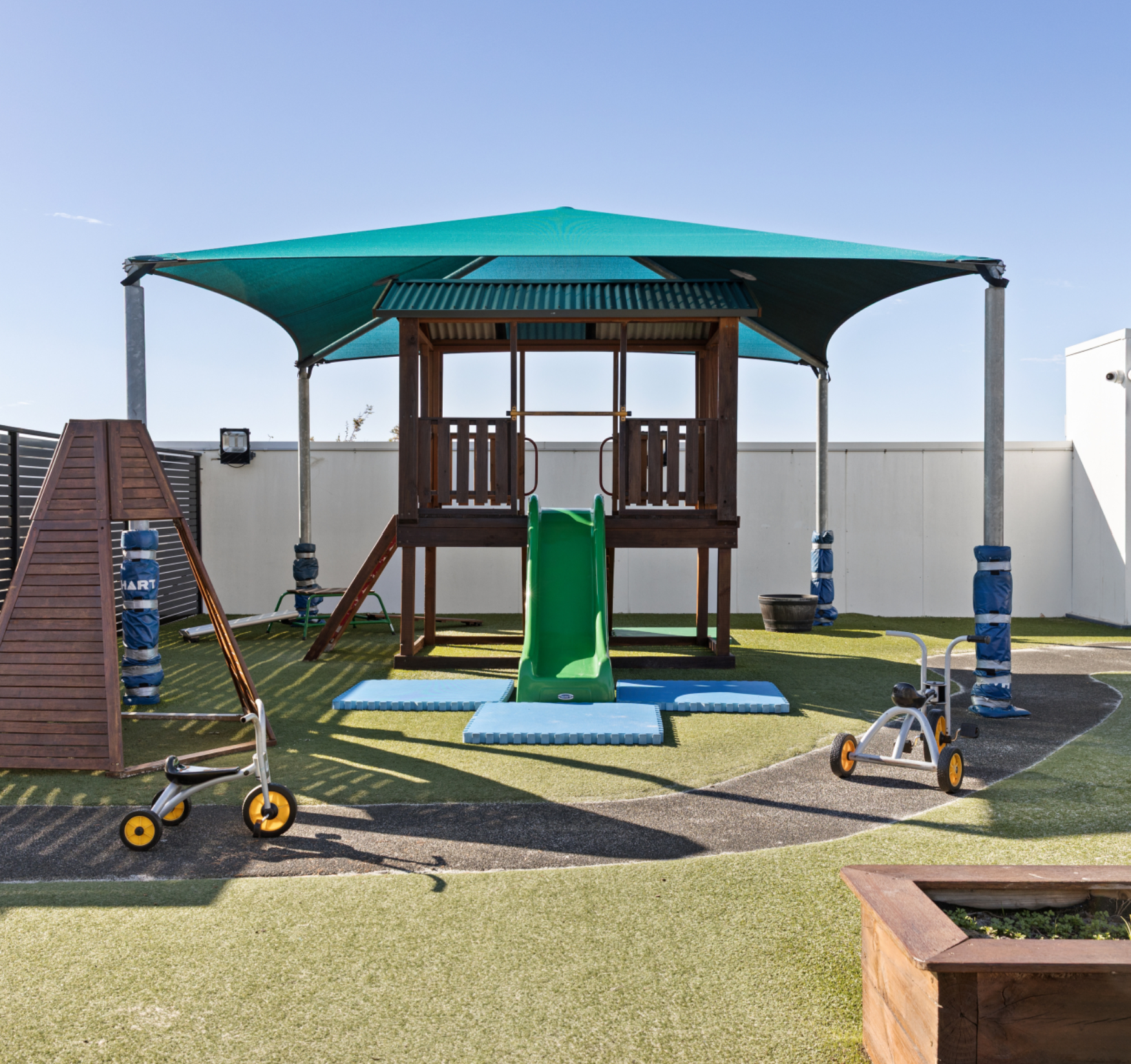 Children playing in a bright, well-equipped room