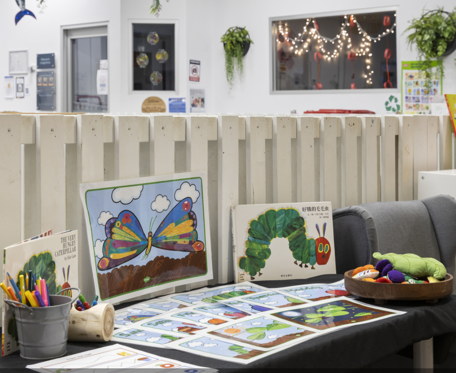 Children's play kitchen area with small furniture
